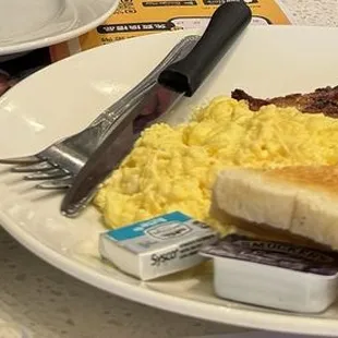 Pork chop with scrambled egg, pineapple bun