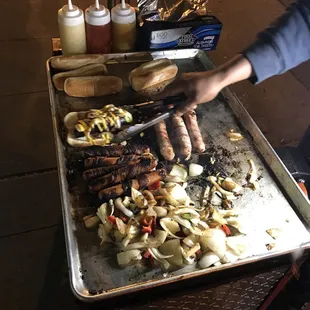 Cook it up, cook it up! This cart has the best damn hot dogs EVAH!