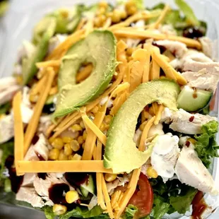 a salad in a plastic container