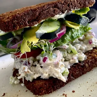 a sandwich on a cutting board
