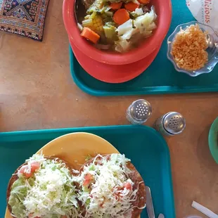 Homemade style caldo de res and bean/avocado tostadas.. they even got the rice done right.