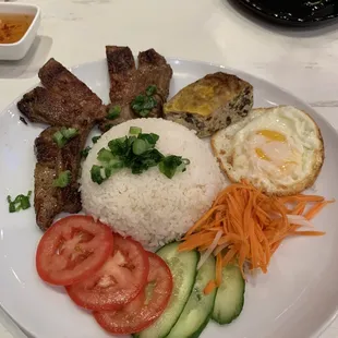 Rice  and pork chop R4. Grill Lemon Grass Porkchop, Shredded Pork skin, Ground Pork&apos;s Egg Yolk Rice Plate