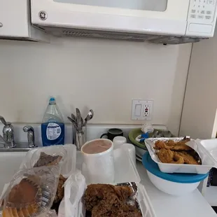 Fried chicken breasts, fried fish, sweet potatoes and sweet potato pie takeout