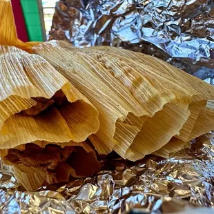 a tamales wrapped in foil
