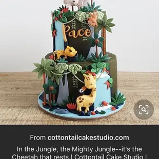 a birthday cake with a jungle theme