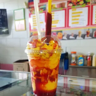 a smoothie in a plastic cup