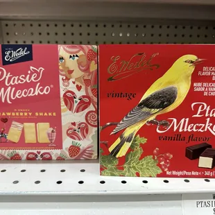 a yellow bird on a red box