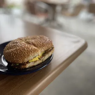 a breakfast sandwich on a plate