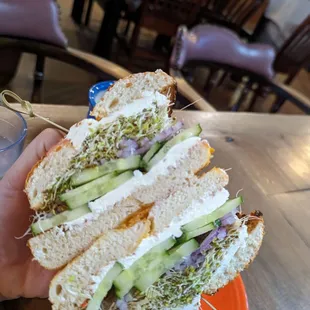 My beautiful bagel. Cream cheese with cucumbers, sprouts, red onion