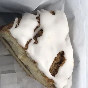 a slice of cake with icing