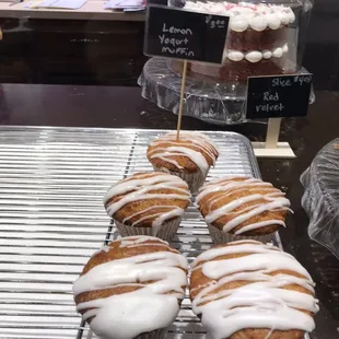 donuts with icing on a cooling rack