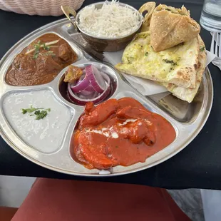 Plate lunch special with butter chicken and lamb curry