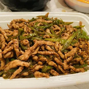 a plate of stir fried food