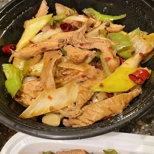 a bowl of chicken and vegetables