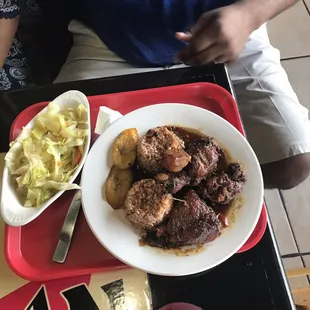 Stew chicken with rice n beans with cabbage with plantains