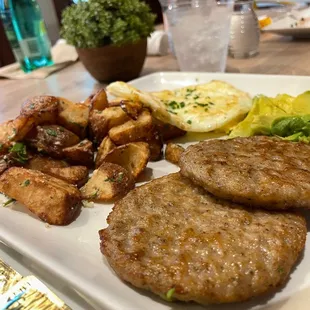 Taters, Sausage, avocado, over medium eggs.