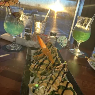 Stuffed jalapeños w seaweed salad, kani, and cream cheese. Delicious!