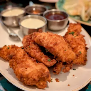 Chicken tenders with hot honey, ranch and barbecue sauce