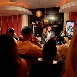 a group of people sitting in a room