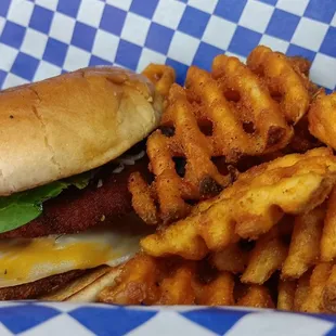 Italian yard bird, double stacked chicken,bacon,and cheese and spring mix with waffle fries