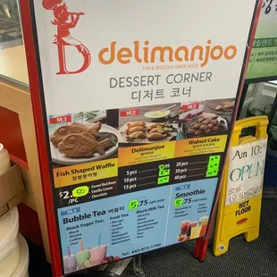 a sign for delimano dessert corner