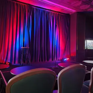 a stage with red and blue lights