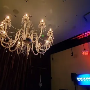 a chandelier and a television