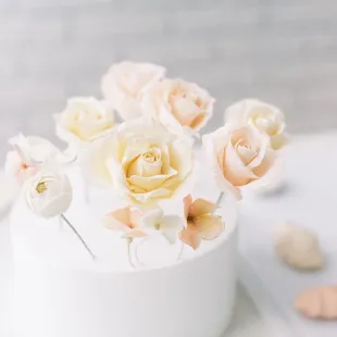 a white cake with flowers in it