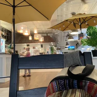 Inside restaurant - large for lots of people and two cute bistro tables outside