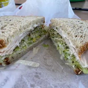 Turkey on whole wheat w/ sprouts, lettuce &amp; cheese