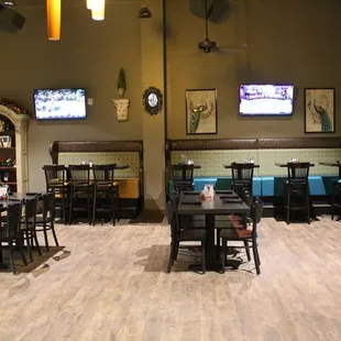 Interior dining area with flat screen TVs and free Wi-Fi