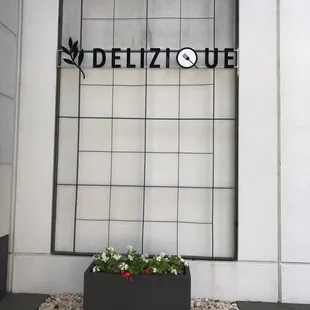 a planter in front of a building