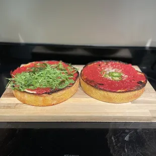 Deep dish Chicago style pizza. Each pie is definitively big enough to feed 2-3 people.