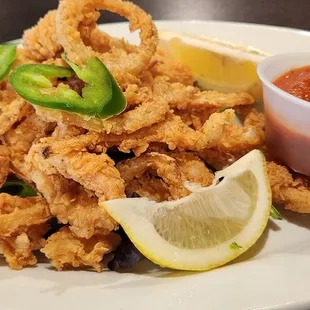 Fried calamari had good texture but was missing some seasoning to make it right.