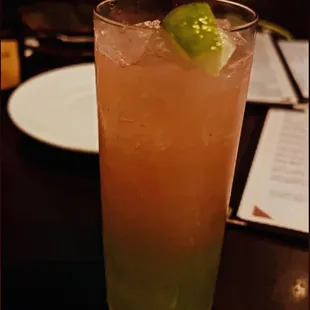 a drink in a tall glass