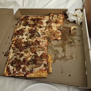 Mushrooms and sausage, ate 4 pieces driving back to the hotel