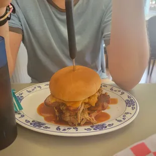 The Beast. The sandwich that has it all - brisket, bacon, sausage, and ham.