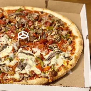 Delmar special with no cheese on half of the pie as requested