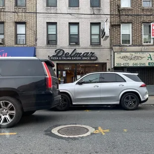 a car being towed by a truck