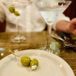 2 Gray goose martinis with hand stuff blue cheese queen olives..