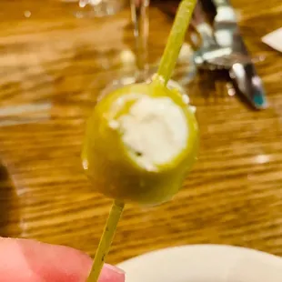 I come for the Hand stuffed blue cheese olives...