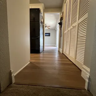 a hallway leading to a bedroom