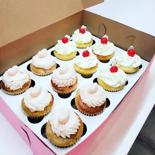 a dozen cupcakes in a box