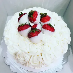 strawberries on a white cake