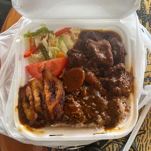 a meal in a styrofoam container