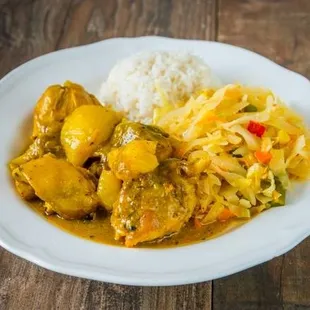 Curried Chicken, white rice and steamed Veg..  #AuthenticJamaicanFood