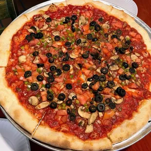 Veggie pizza ($25-no cheese, extra sauce)