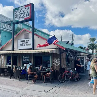 Outdoor seating with the bar just inside when thirsty!