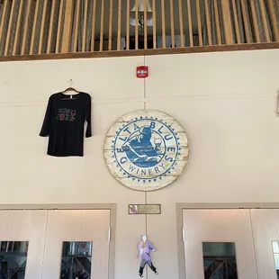 t - shirts hanging on the wall