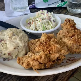 Spicy Cajun fried chicken dinner w/ mash potatoes and chicken gravy ( had chicken shreds in it,yum), coleslaw